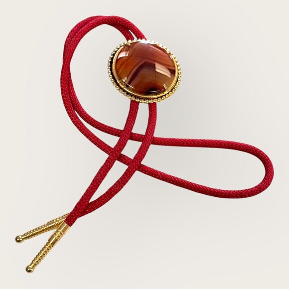 Western Bolo Tie Brown Stone Red Cord Gold-Tone Tips Southwestern - Picture 1 of 5
